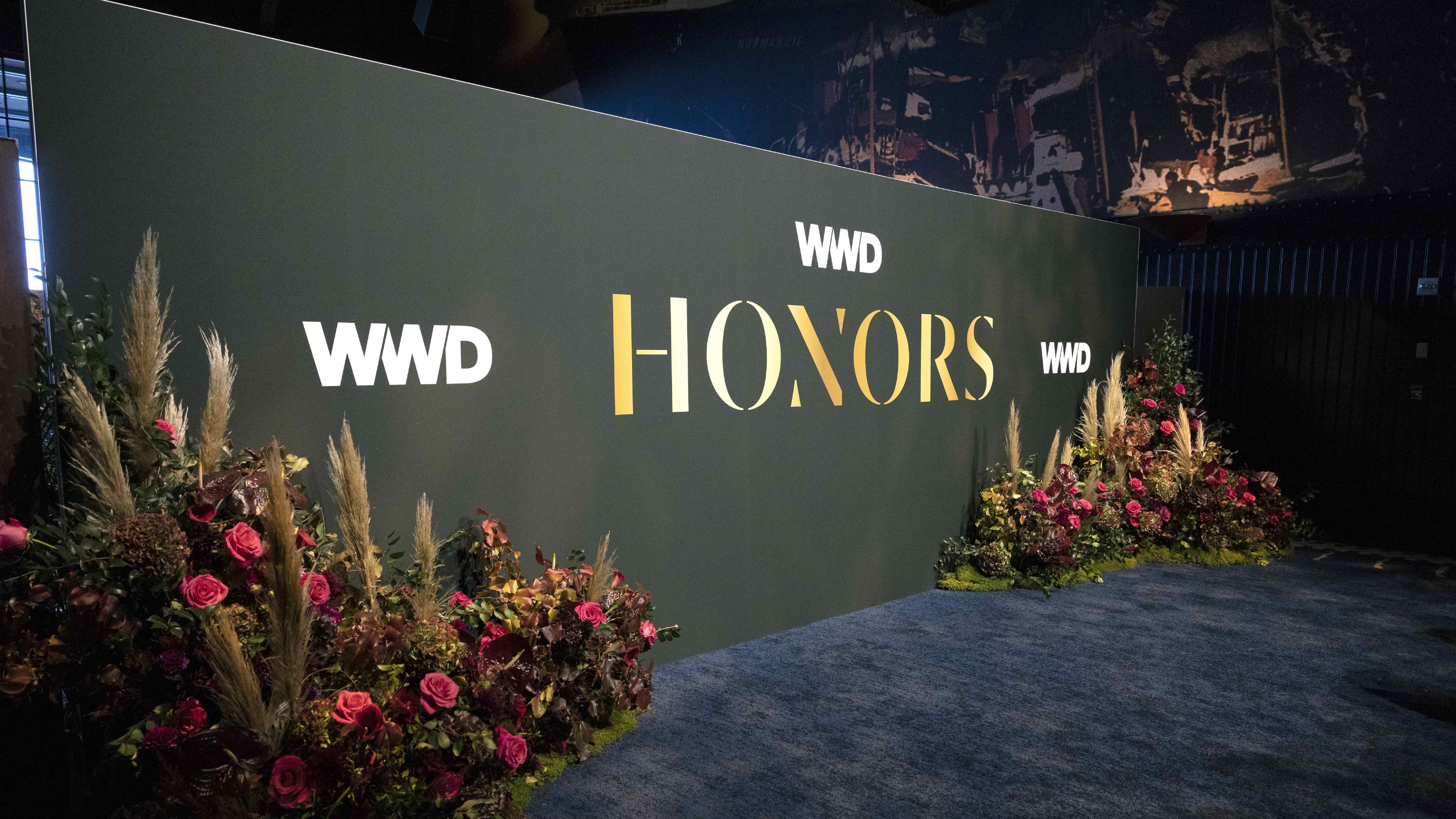 WWD Honors branding on a stage backdrop