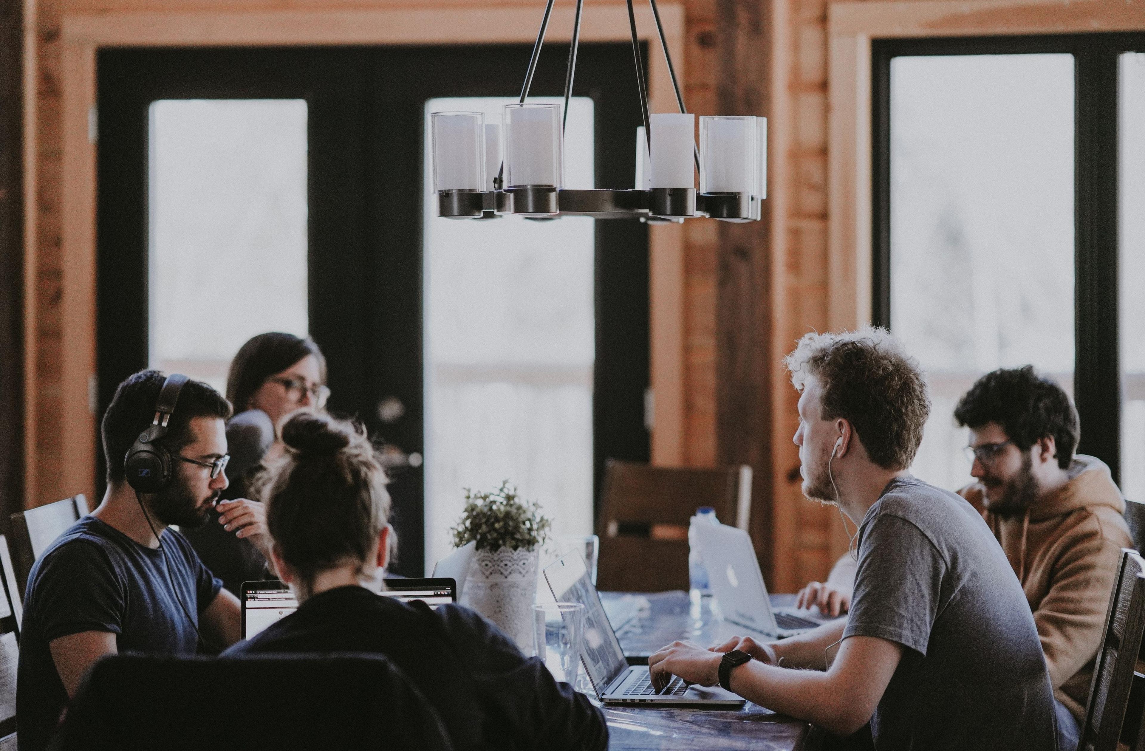 Group of people working together at a table