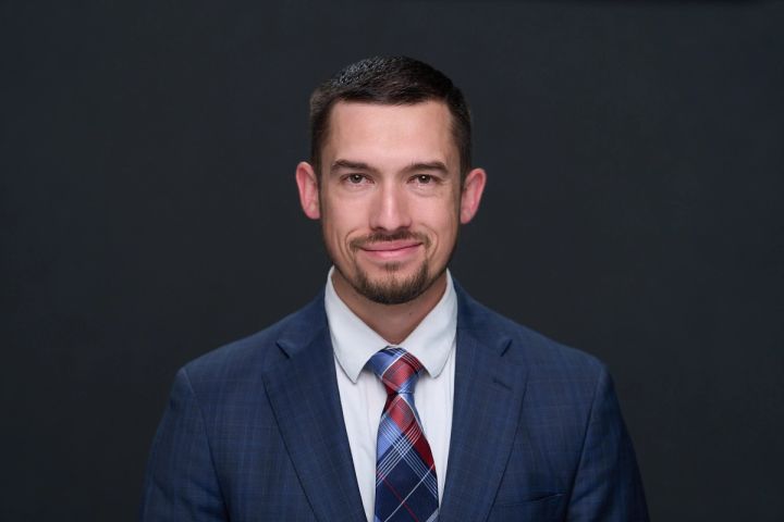 Professional portrait of Derek Farmen, D.C.