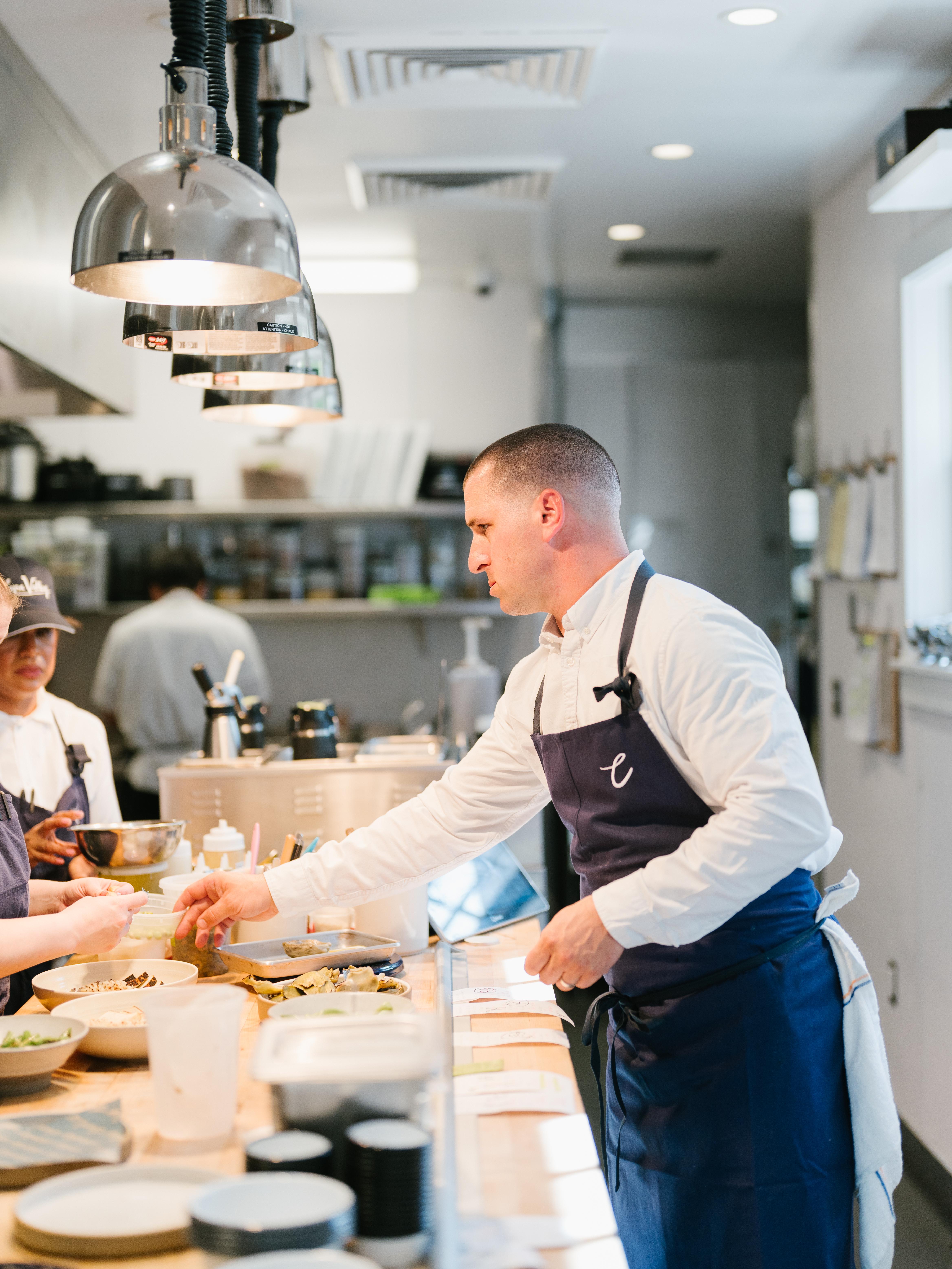 Chef Elliot Bell in the kitchen at Charlie's Napa Valley.