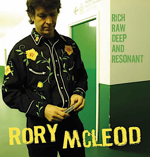 Rory poster in flowery shirt backstage.