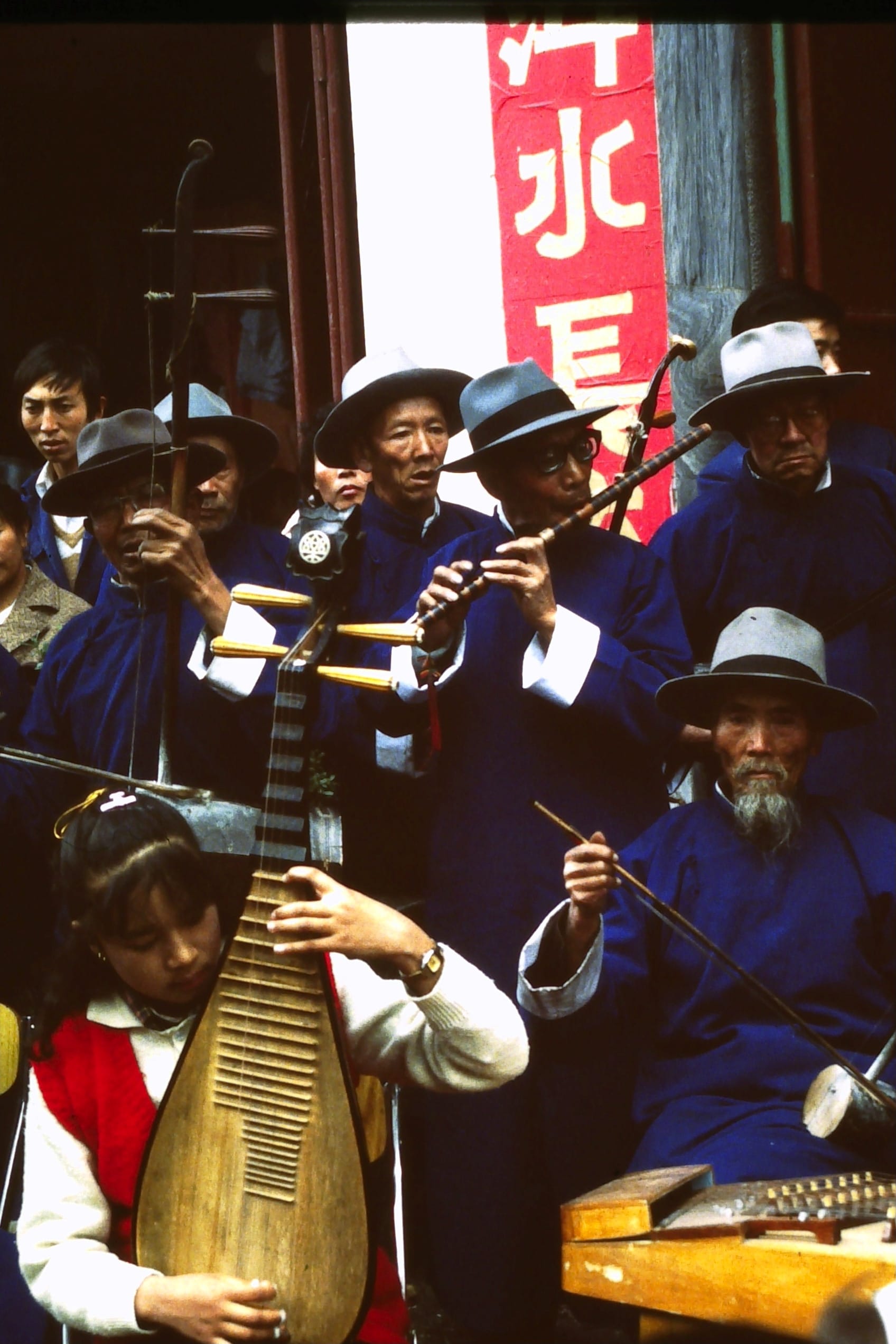 Band of musicians including young girl playing the Pippa Dali Chinese new year.