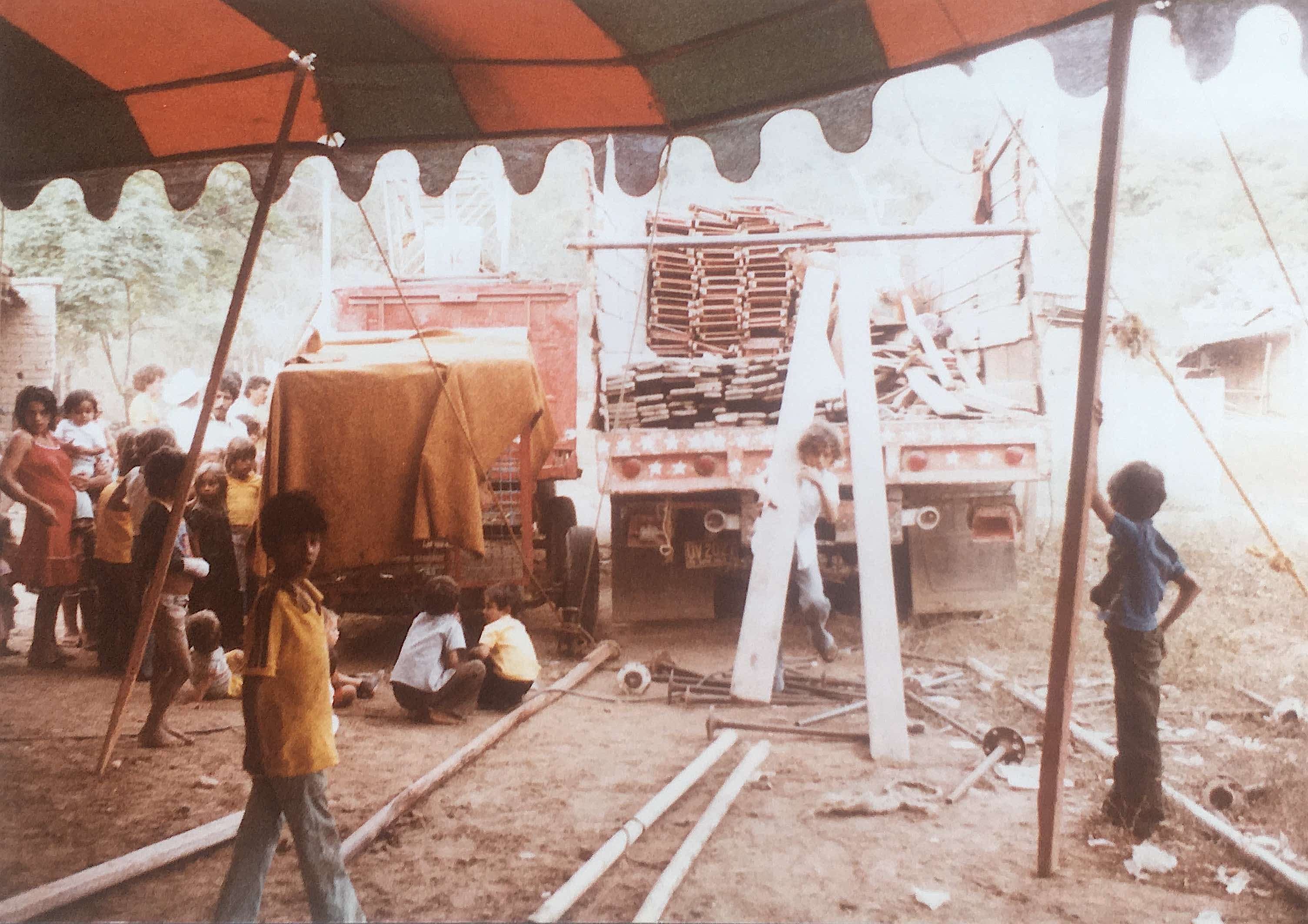 Carrying and assembling the seating into circus tent. Mexico.