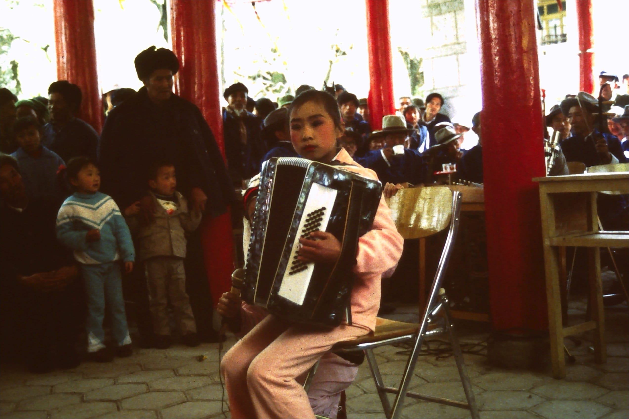 Dali Chinese new year. Young Accordion player.