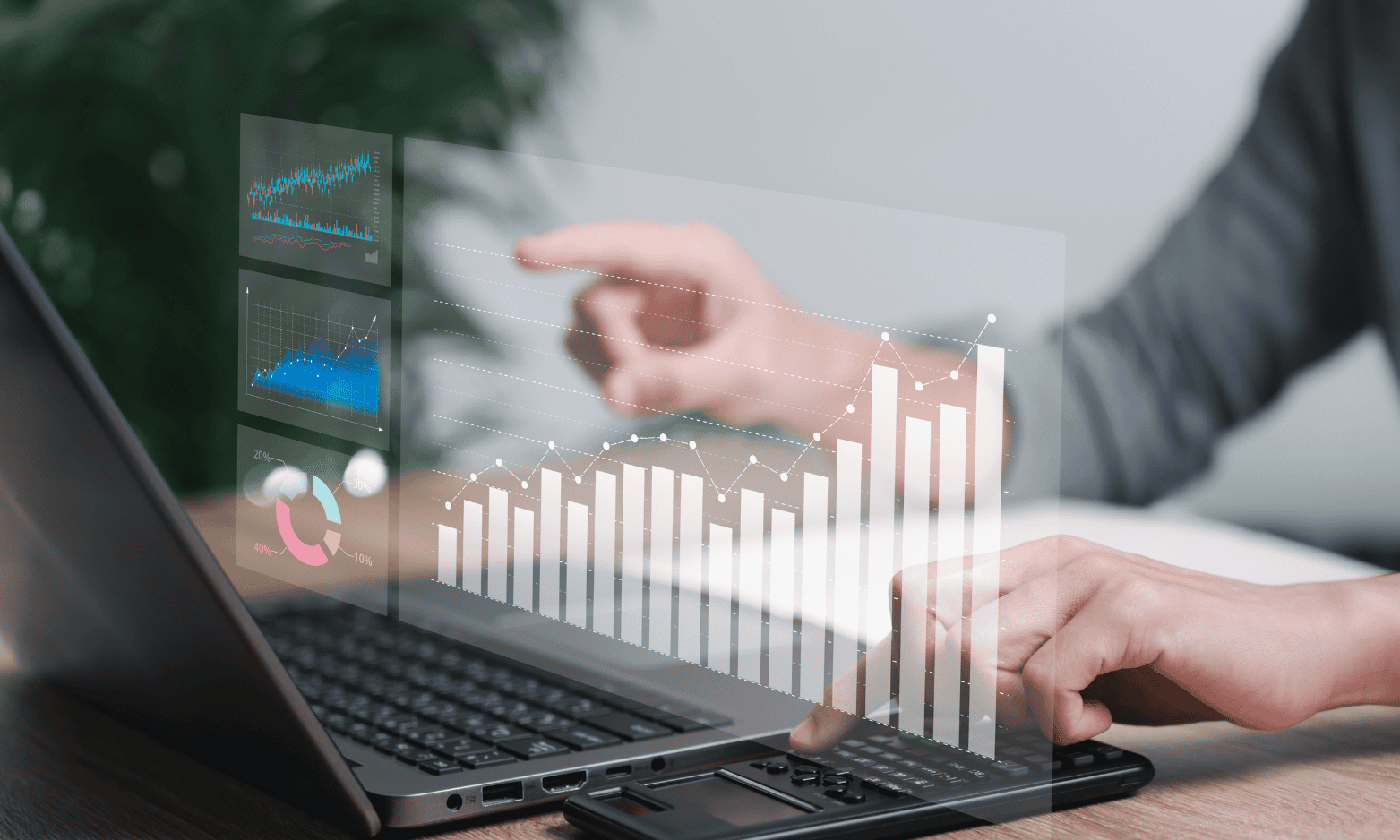 Xero Accounting Solutions – Business professional analyzing financial data on a laptop with digital charts and graphs, representing automated bookkeeping and accounting with Xero software. Learn more in the brochures section at CodeAutomation.ai.