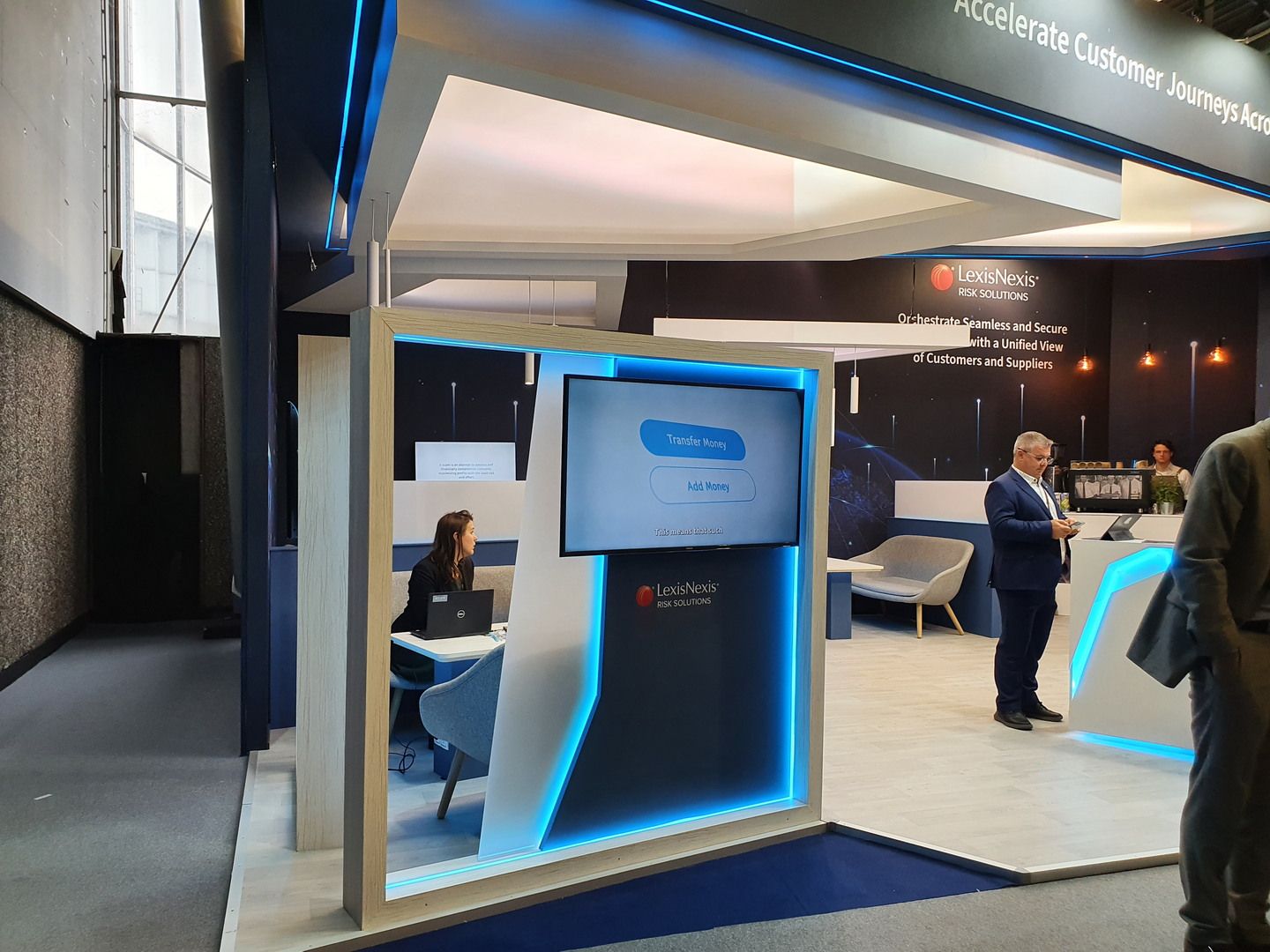 Perspective of the LexisNexis Risk Solutions stand at SIBOS 2022 with meeting areas and audiovisual content