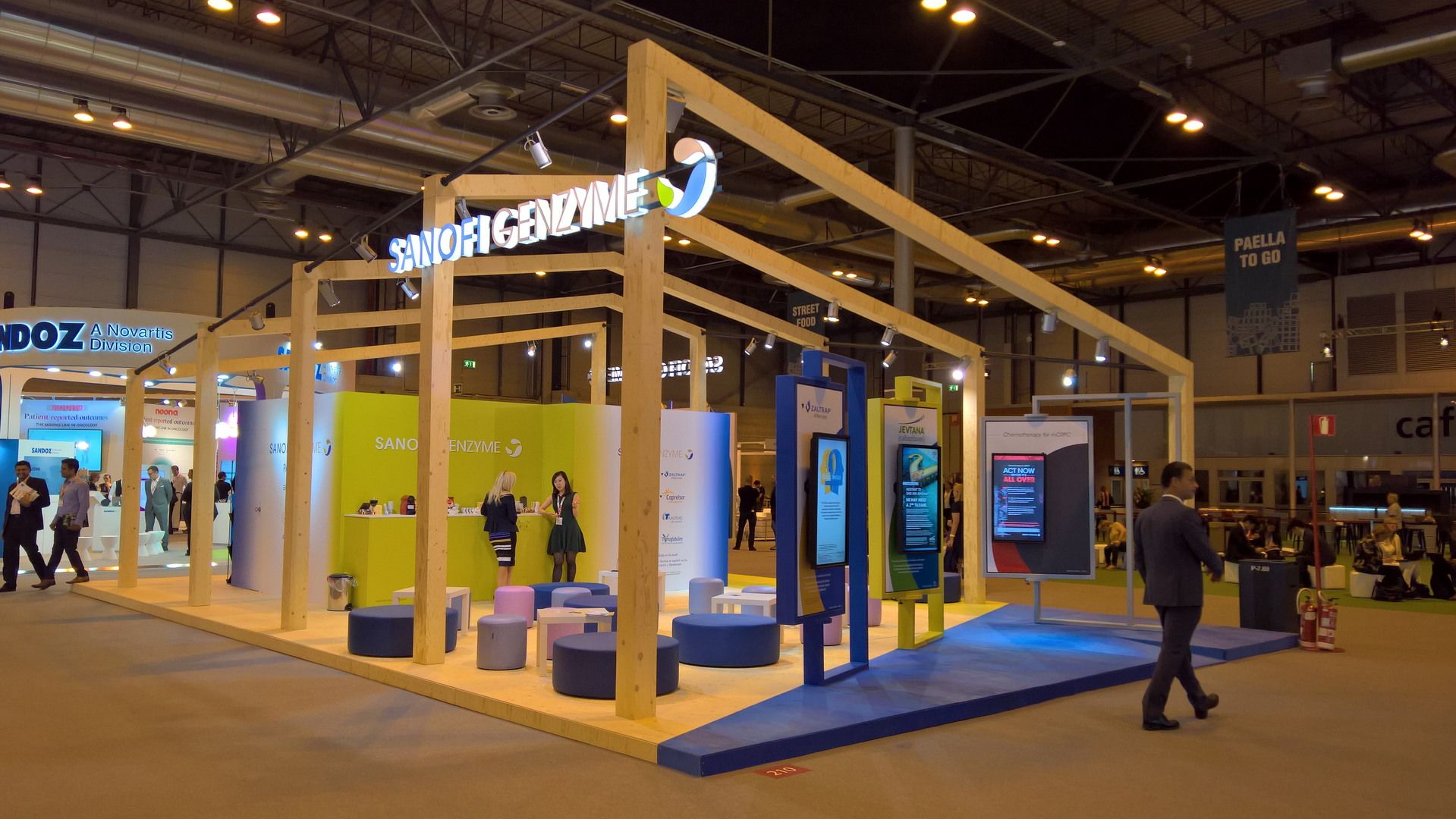 Sanofi Genzyme branding above the stand perimeter — Sanofi Genzyme · ESMO