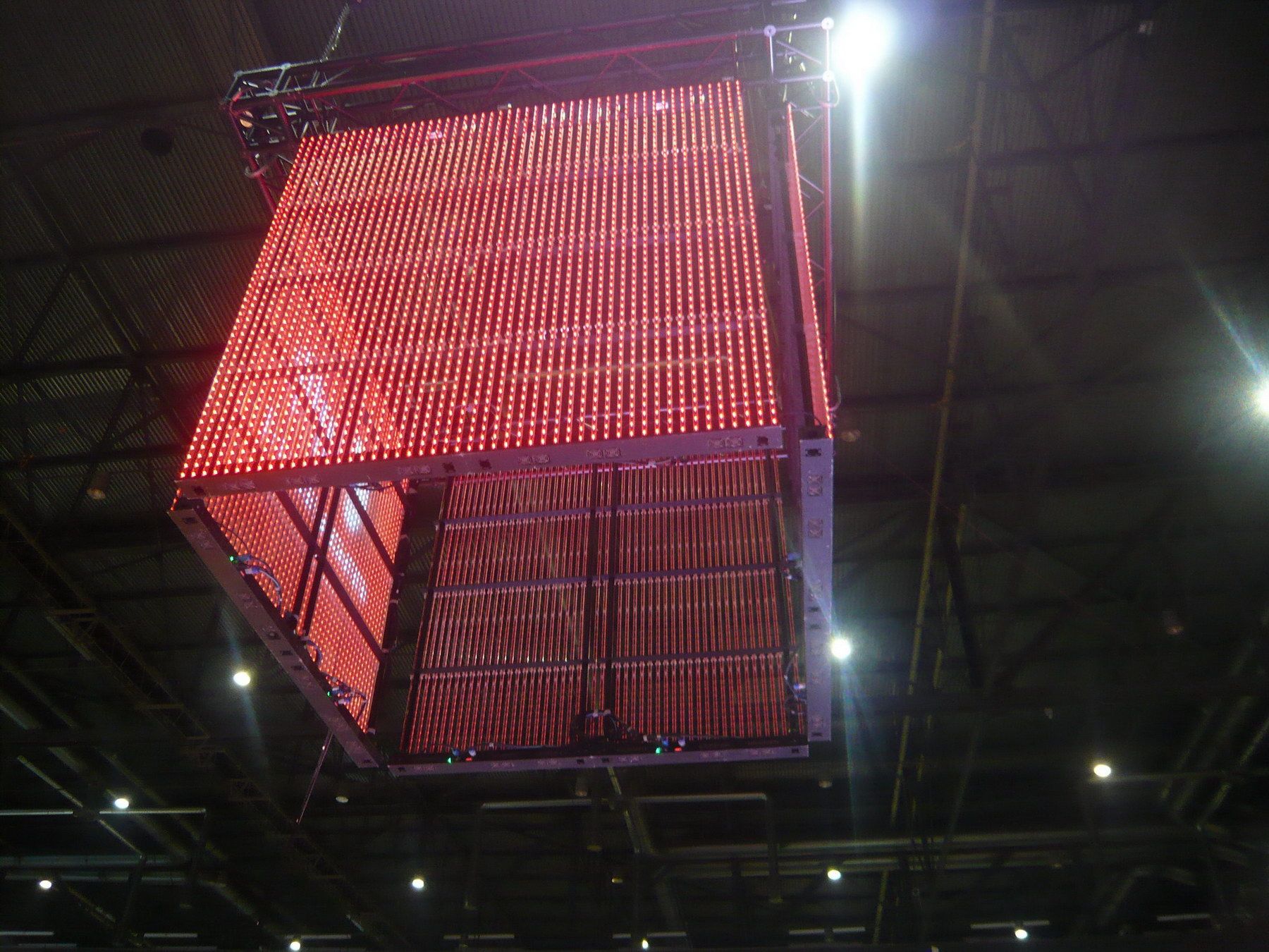 Red illuminated exterior above the entrance — Angola · ITU