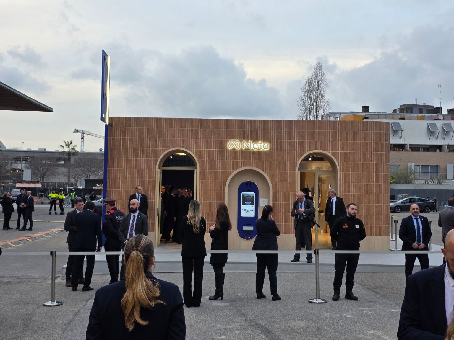 Meta front facade with arched entrances and ceramic cladding at MWC 2026