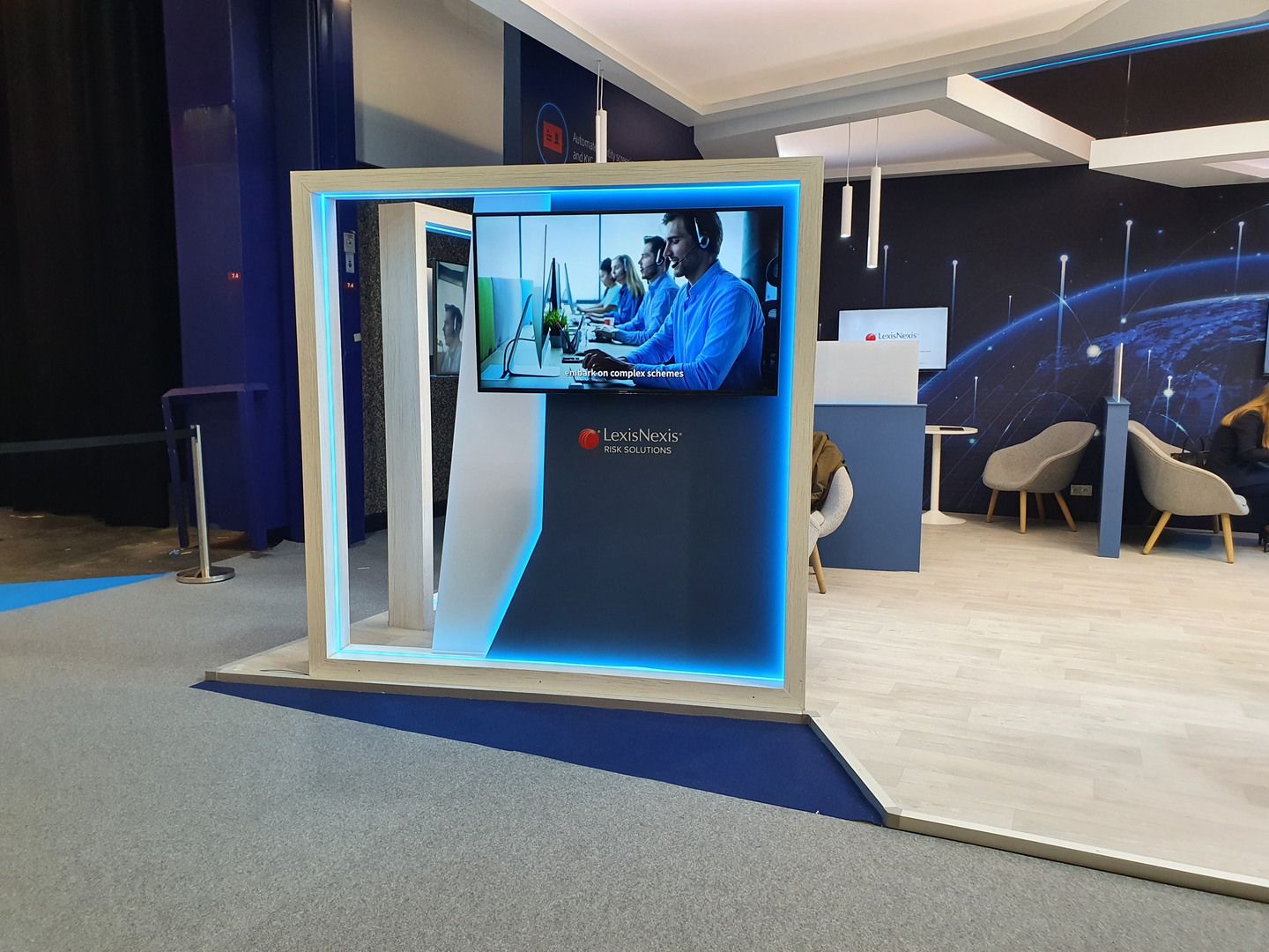 View of the LexisNexis stand at SIBOS Amsterdam with audiovisual screen and interactive areas