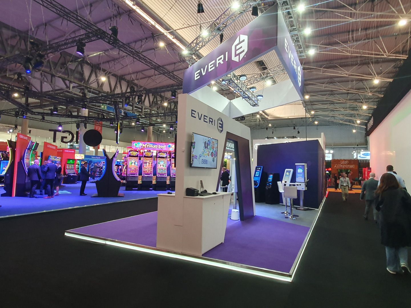 Aisle view of the Everi stand with overhead branding and open access at ICE Barcelona 2025