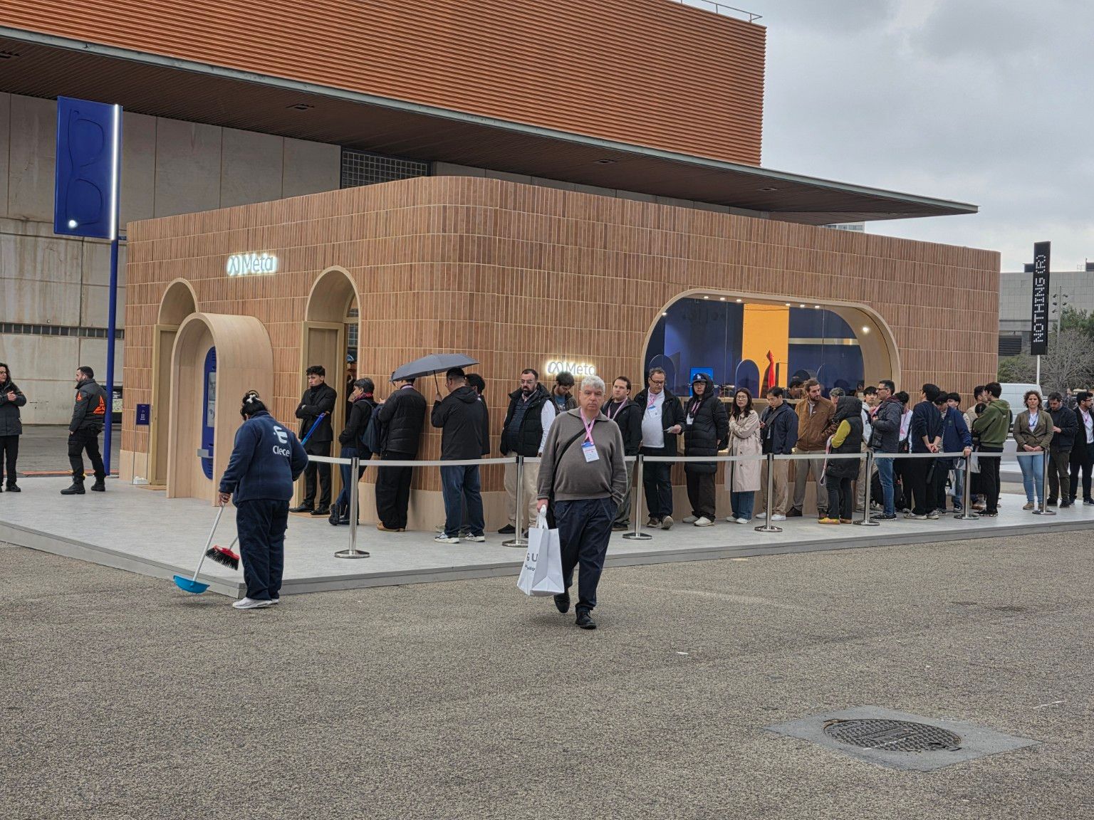 Visitors waiting alongside Meta’s outdoor pavilion at MWC Barcelona 2026