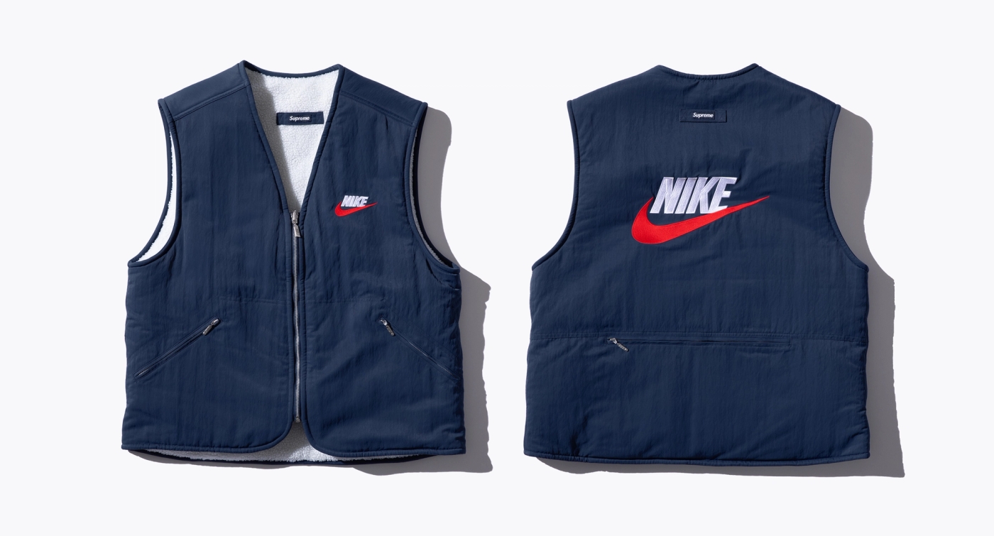 Reversible Nylon Vest with sherpa fleece lining and embroidered logos. (22/38)