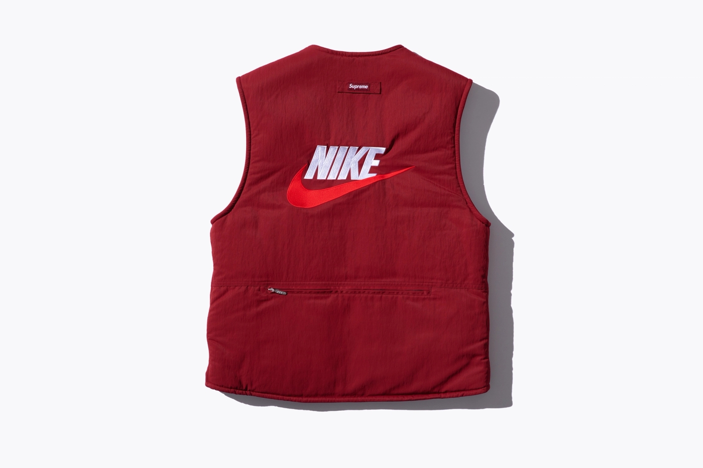 Reversible Nylon Vest with sherpa fleece lining and embroidered logos. (18/38)