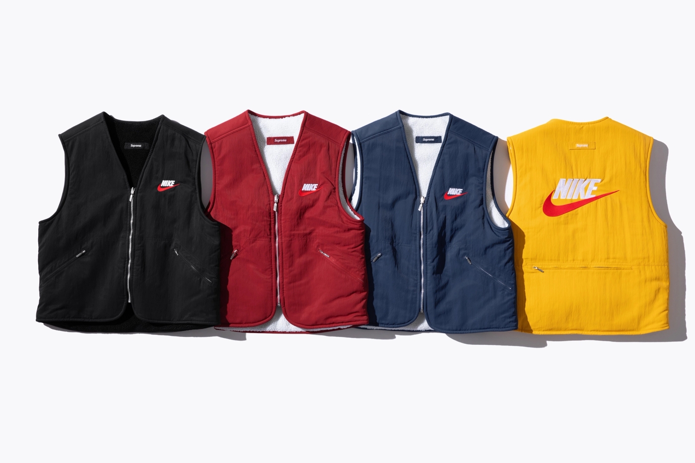 Reversible Nylon Vest with sherpa fleece lining and embroidered logos. (23/38)
