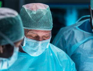 Surgeon closeup, wearing mask