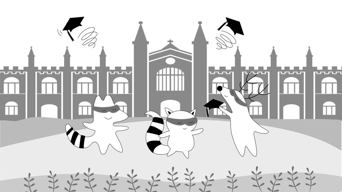 Soren, Benji and Iggy throwing hats in the air, as if graduating from university.
