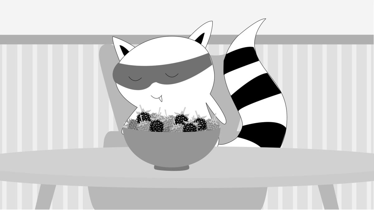 Benji is eating a bowl full of blackberries and strawberries.