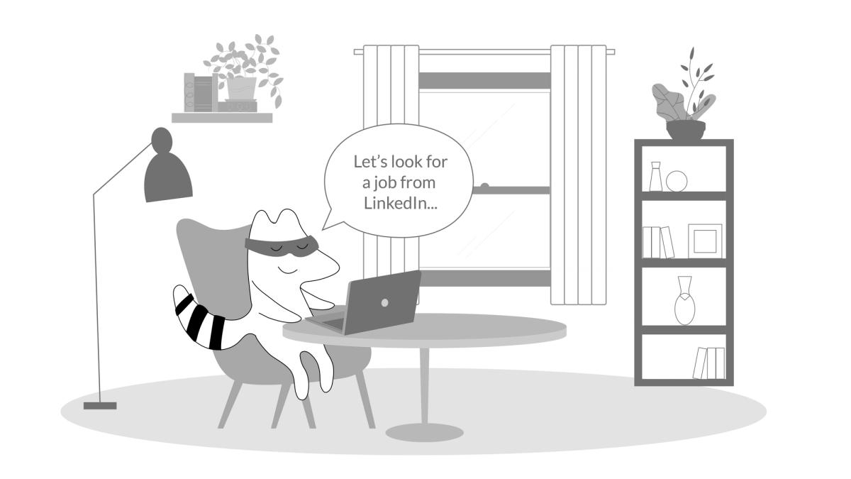 Iggy sitting down in front of her computer, using LinkedIn to look for a job.