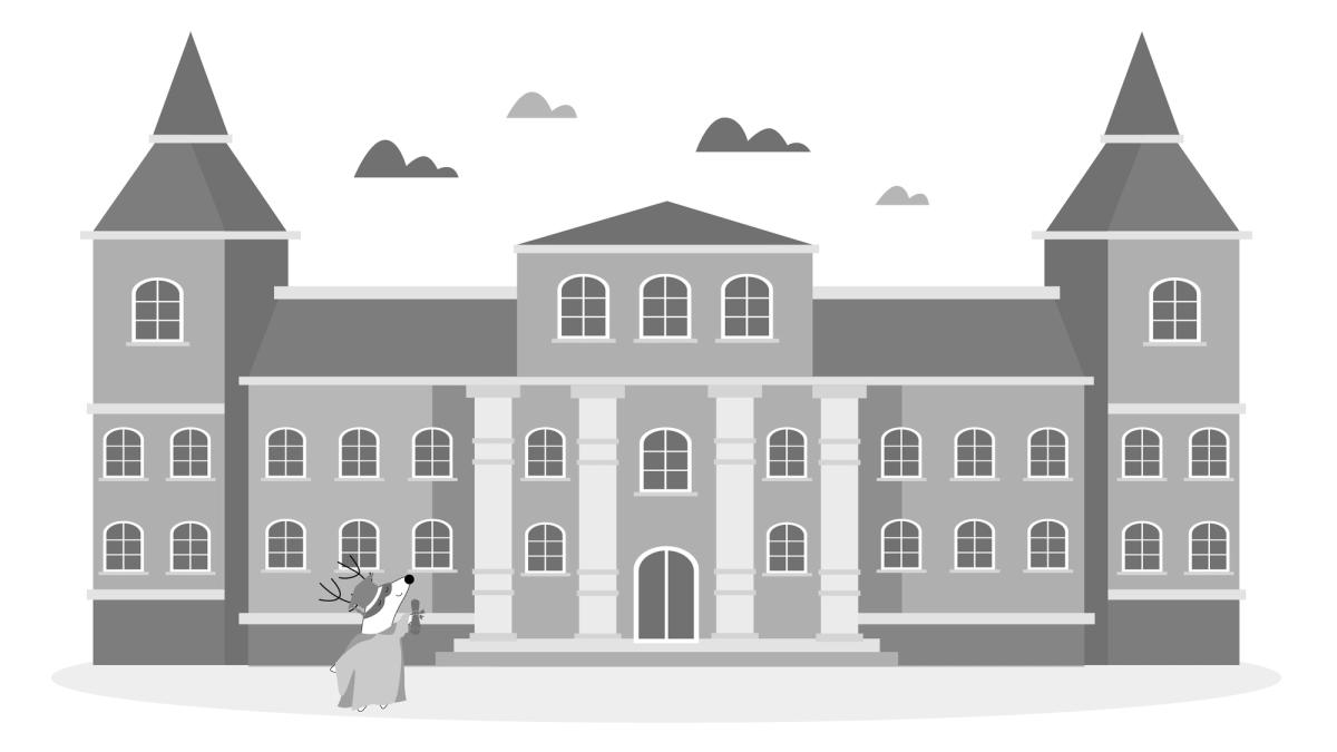  Soren standing in front of a university, wearing a graduation cap