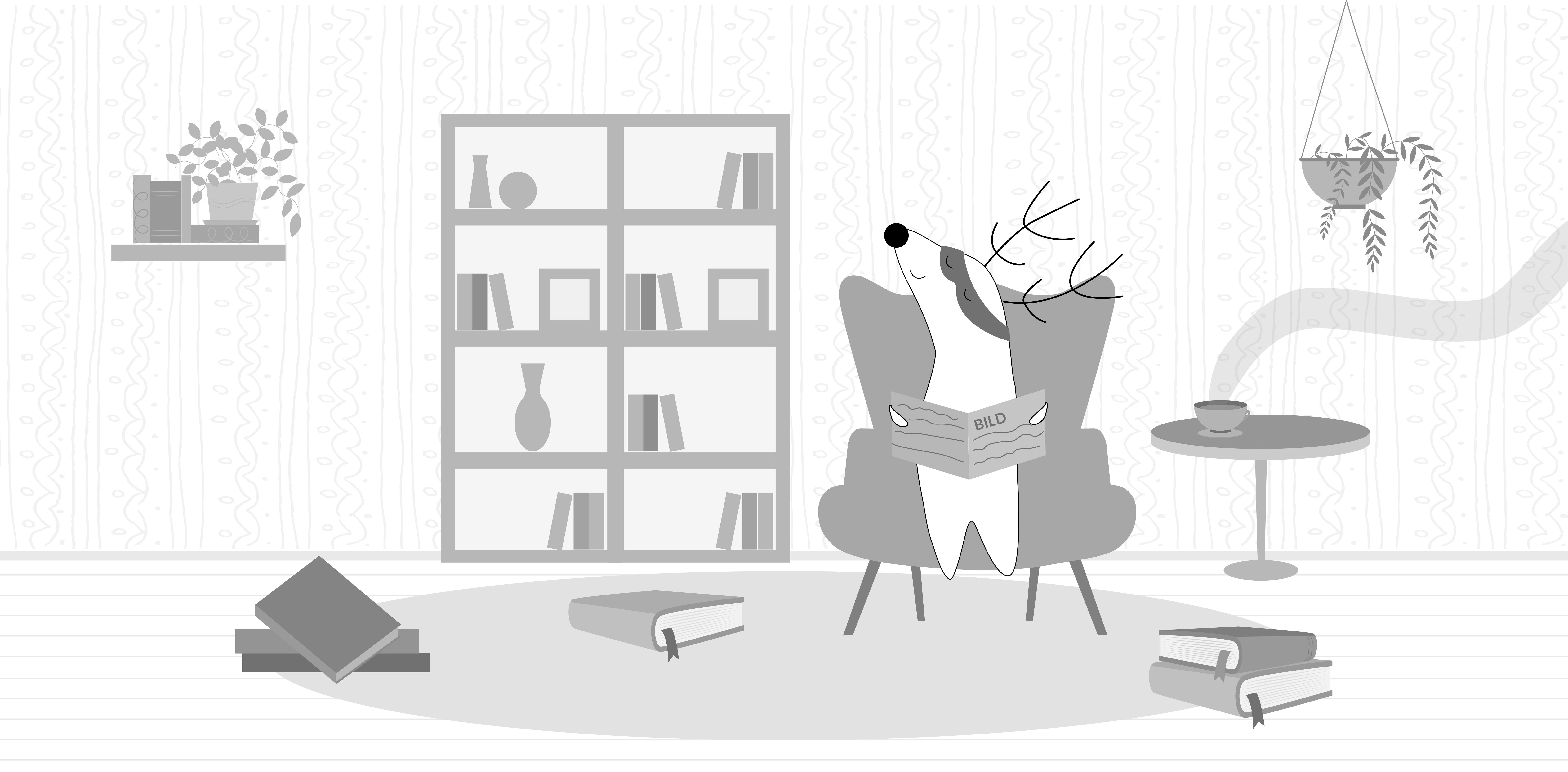 Soren reads a Bild newspaper while having a cup of coffee in the morning.