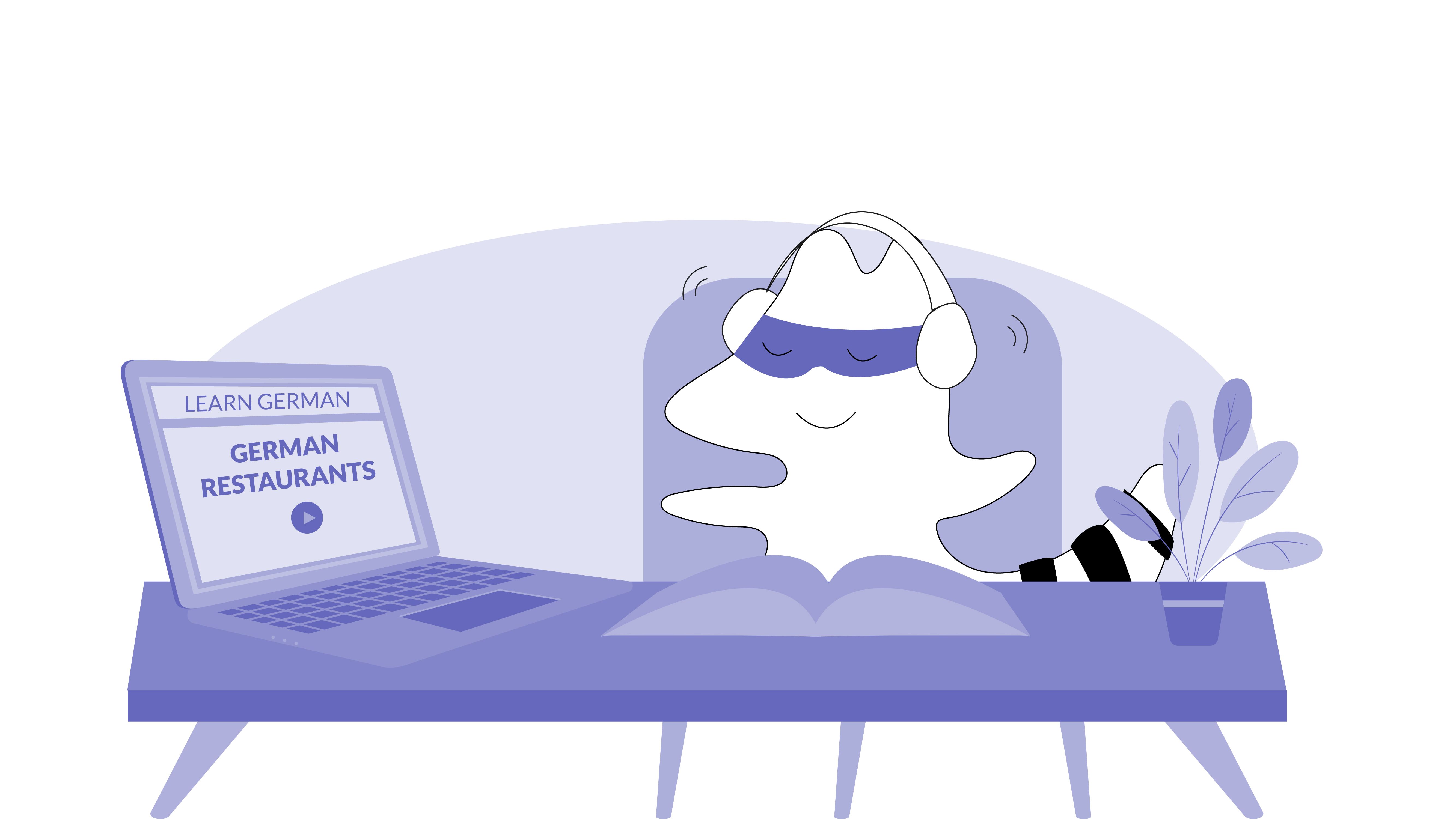 Iggy in front of his computer, watching a video about German restaurants.