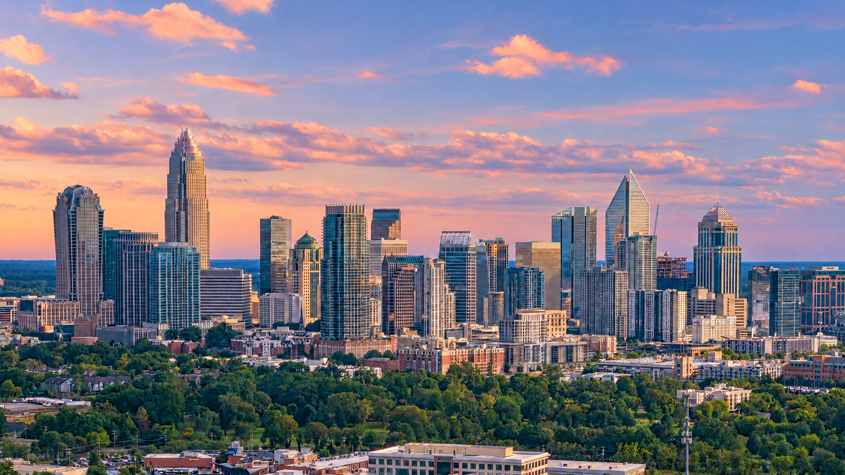 Charlotte, North Carolina skyline with a warm pastel sky