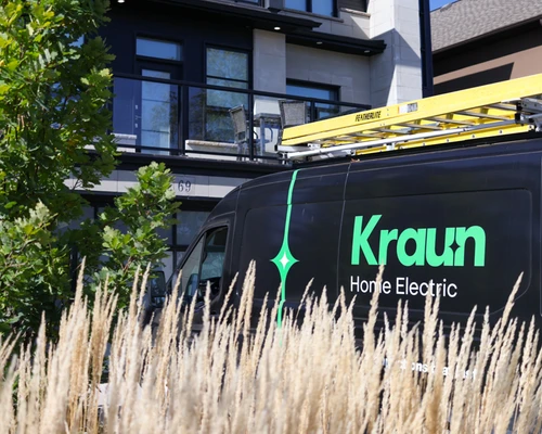 Kraun Home Electric vehicle near a home