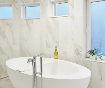 Elegant fixture above a soaker tub