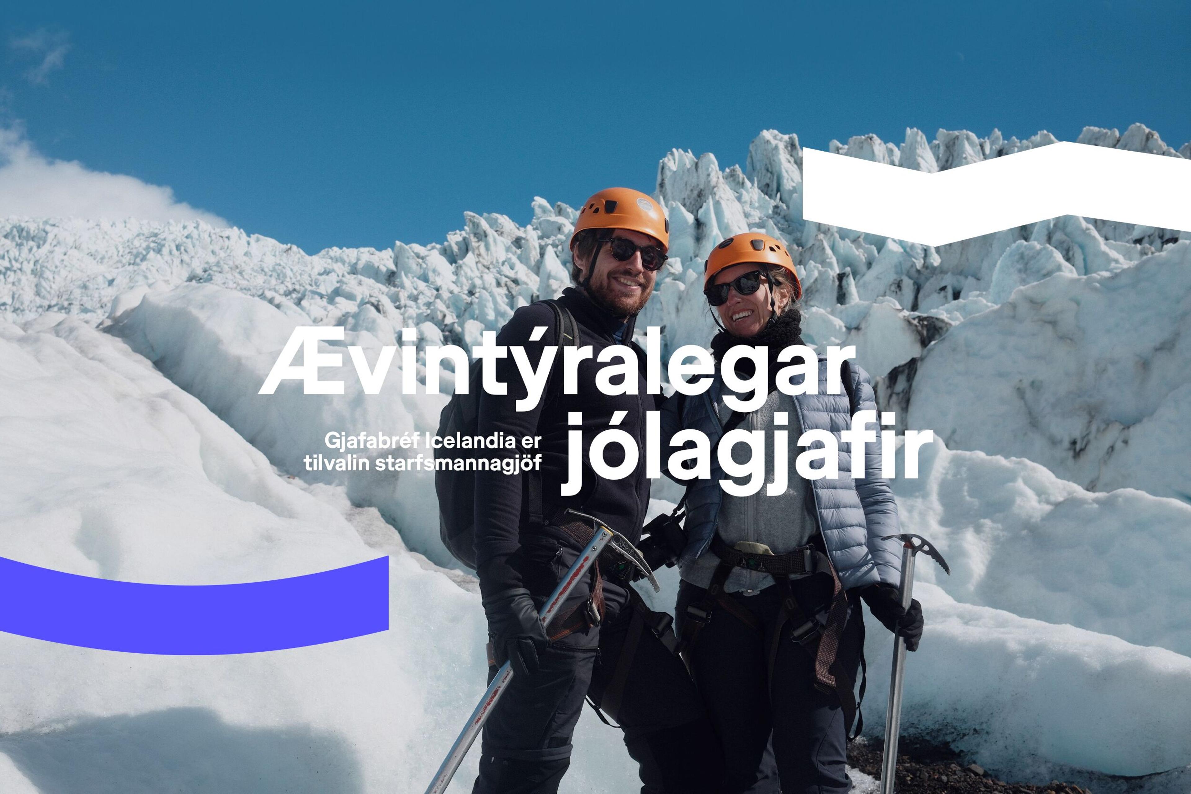 Two smiling people in helmets and winter gear holding ice axes on a glacier. Text: "Adventure Christmas gifts. Gift certificates Iceland are the ideal employee gift."