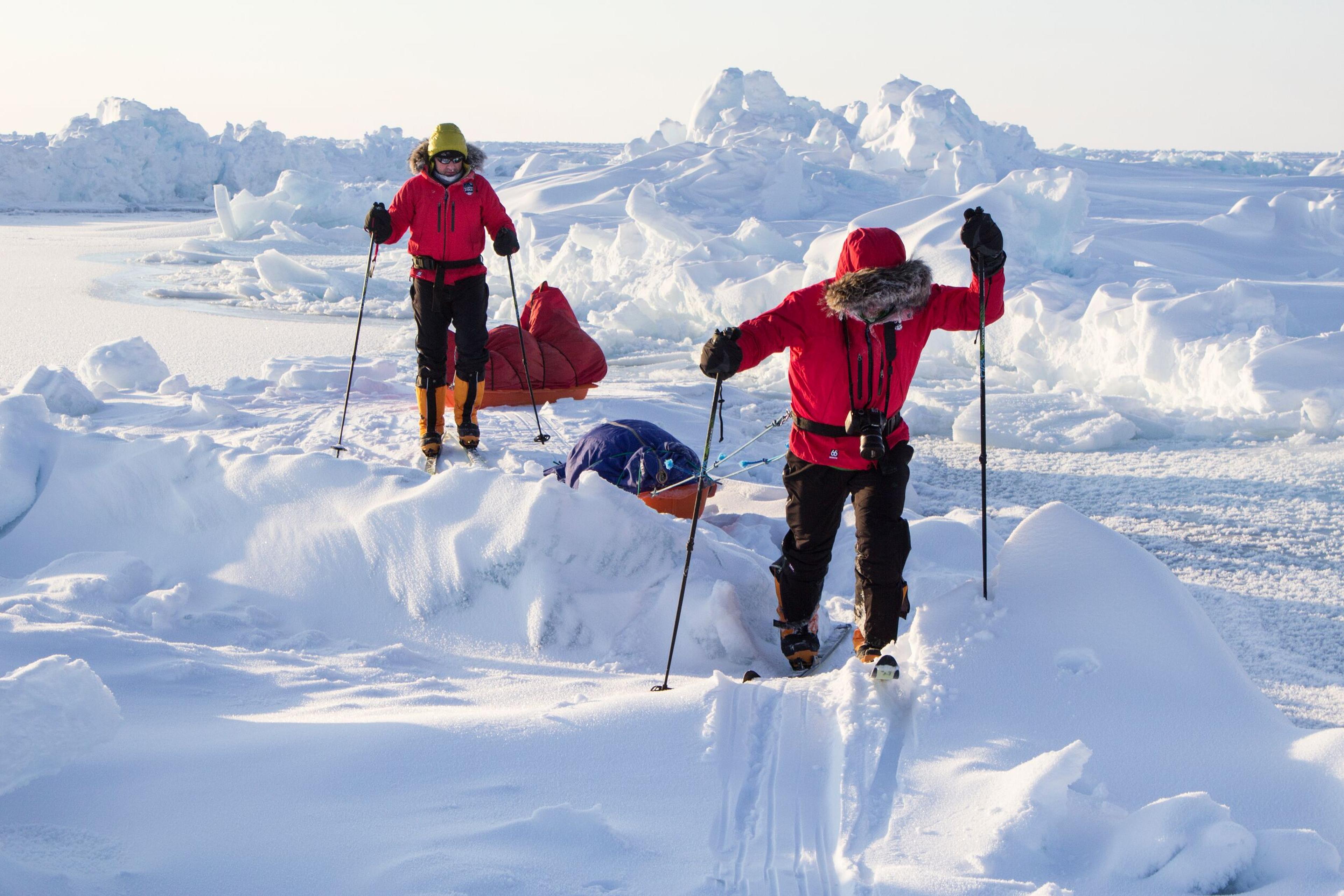 Two Explorers on skis traversing the Vatnajökull Glacier in Iceland