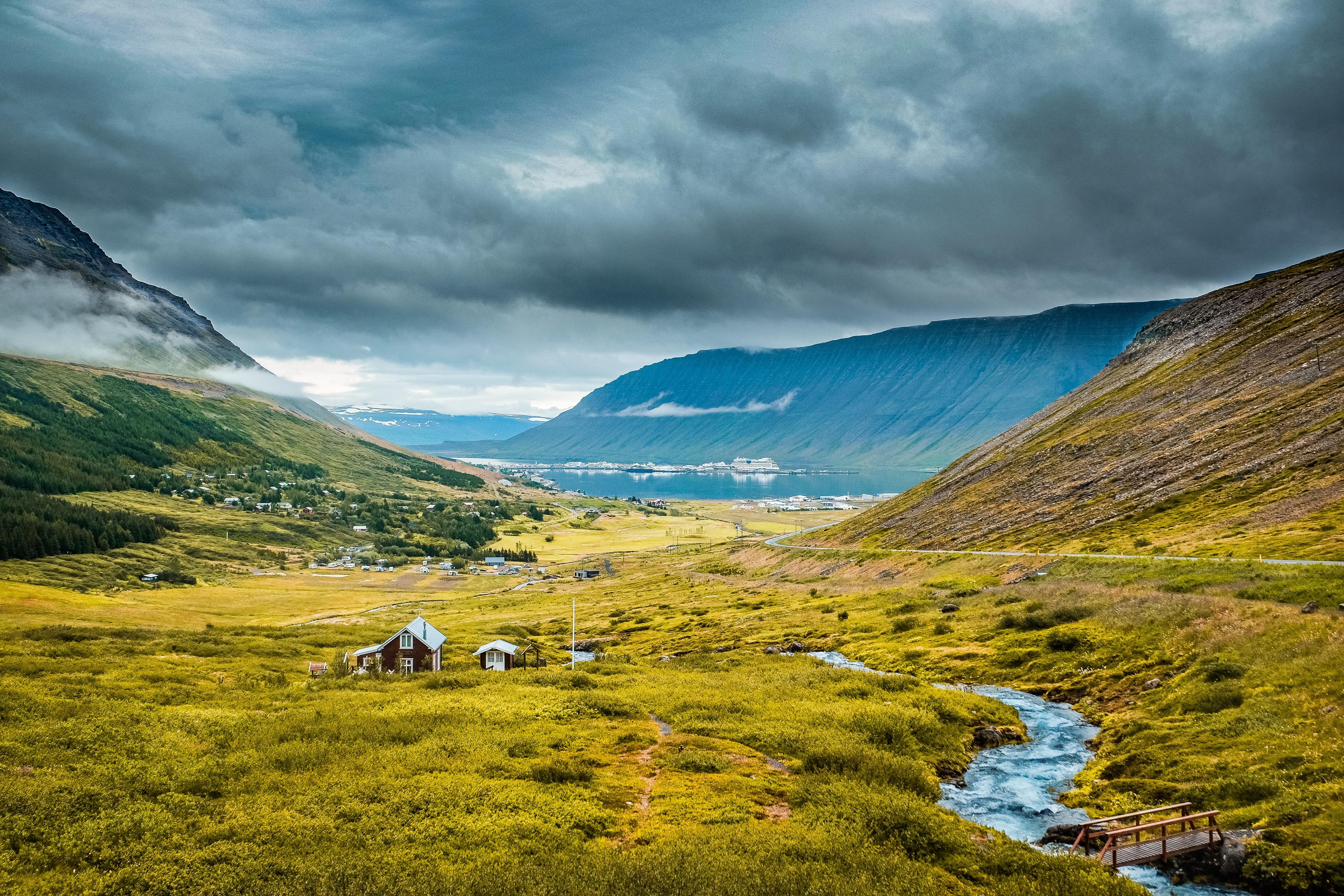 Remote fjord landscape with dark clouds
