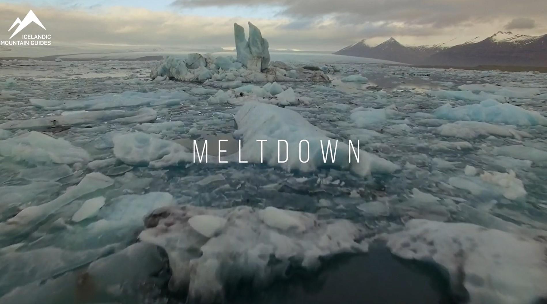 A striking scene of melting icebergs in a glacial lagoon, likely Jökulsárlón or a similar location in Iceland. The title "MELTDOWN" in bold letters reinforces the visual message of climate change and glacial retreat.