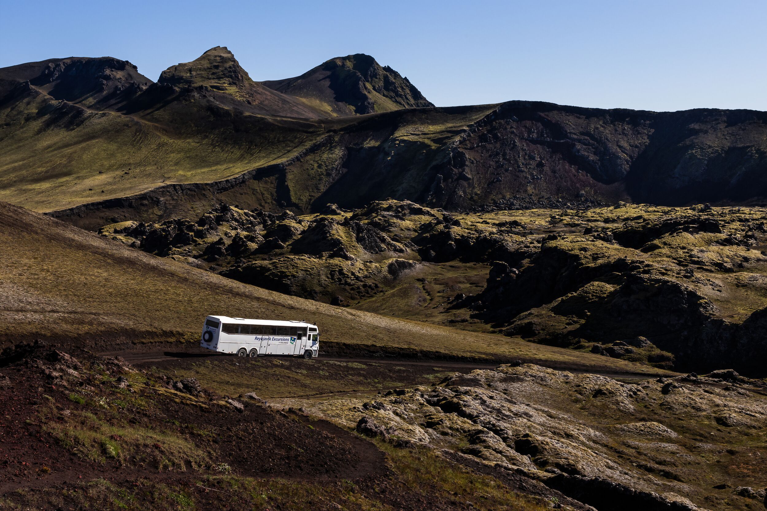 The highland bus crossing rugged terrains