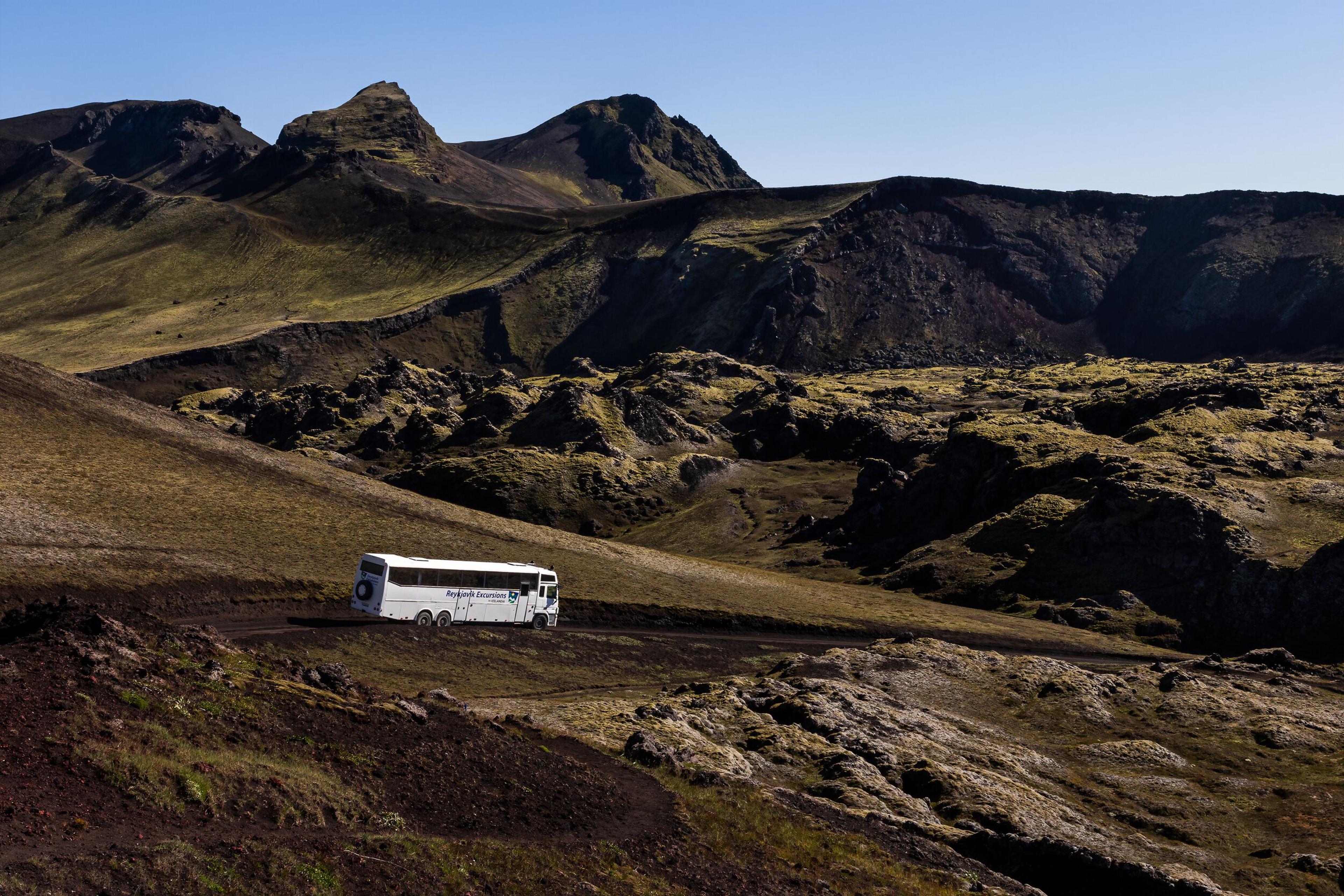 A reykjavik Excursions highland bus driving in the Icelandic highlands.