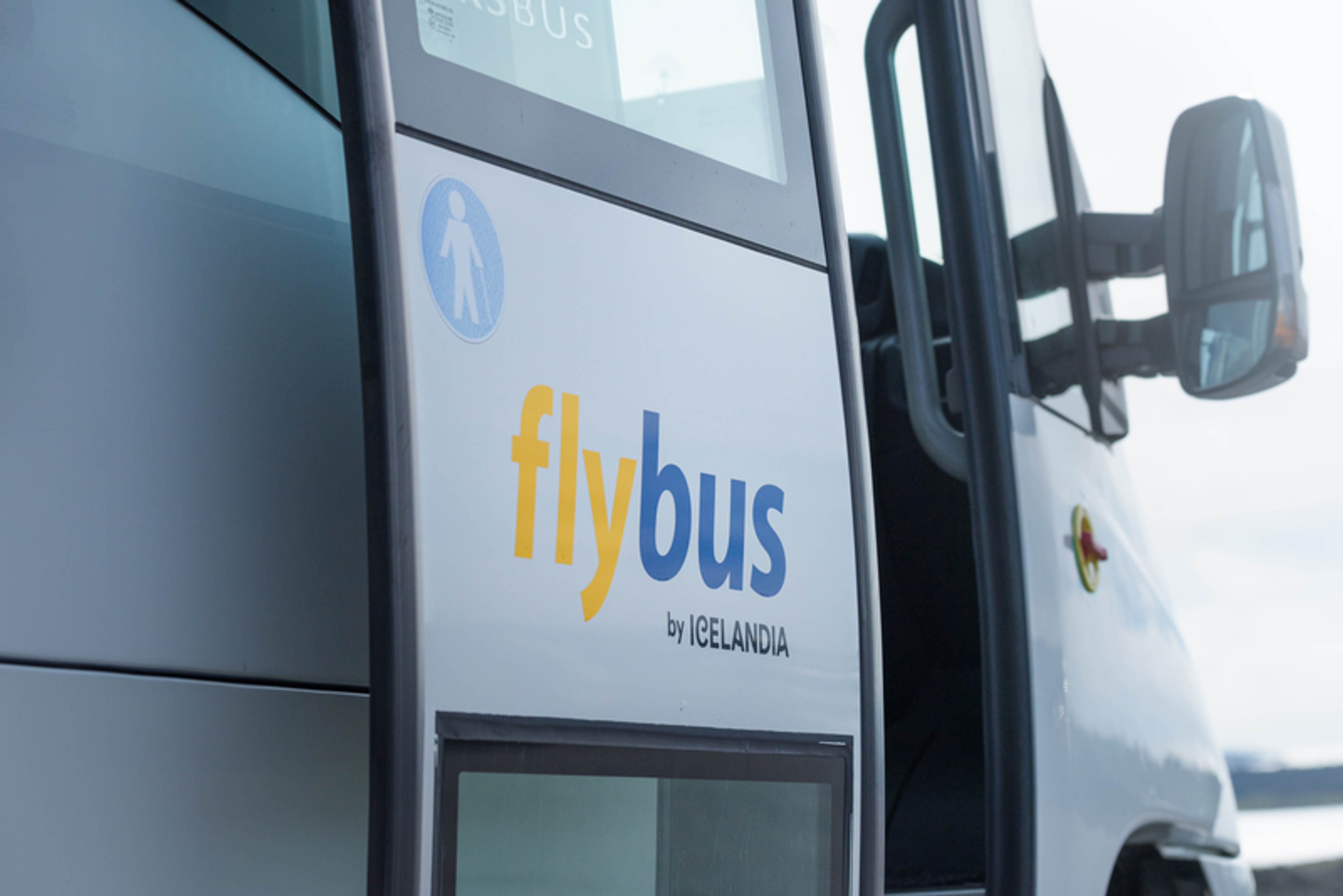 Flybus door open for people to step on board