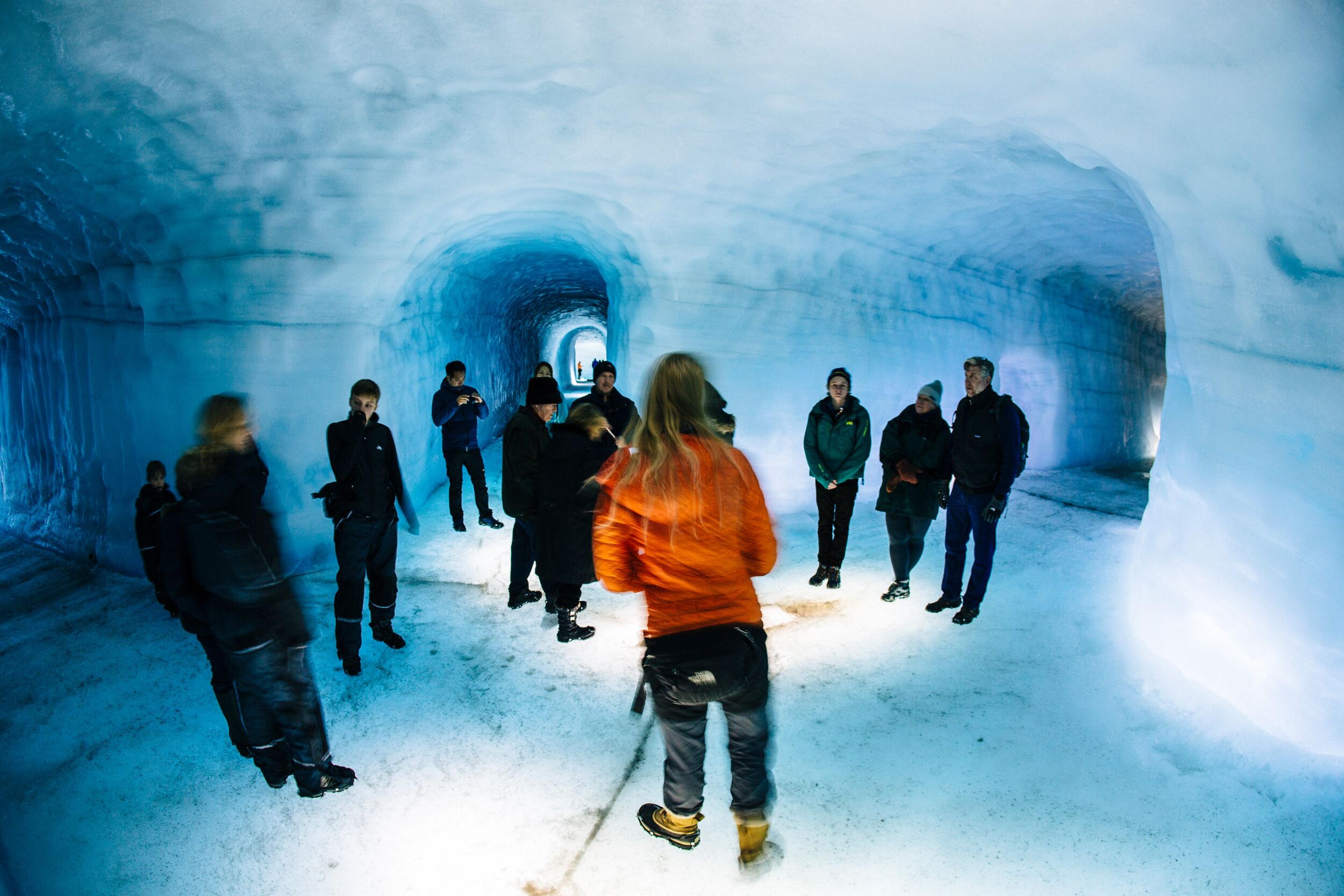 A group of tourists inside the Langjökull Ice cave in Iceland.