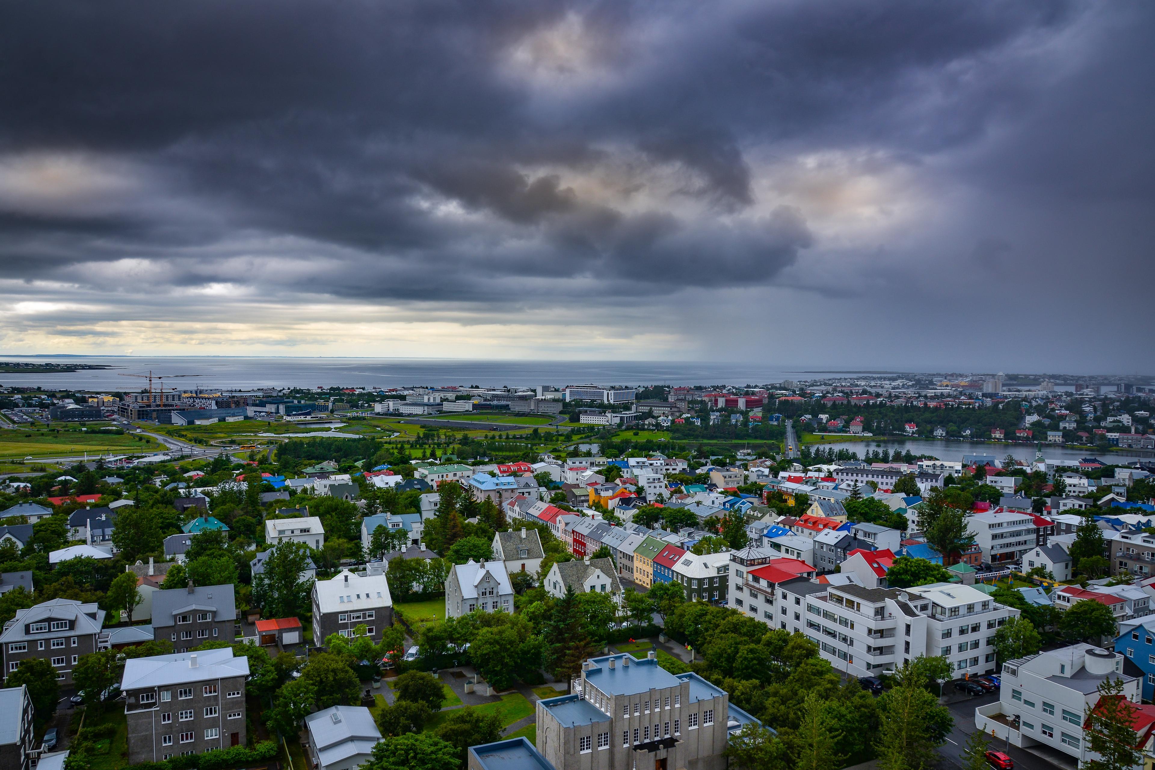 Aerial perspective of Reykjavík showcasing the abundant green spaces interspersed throughout the city.