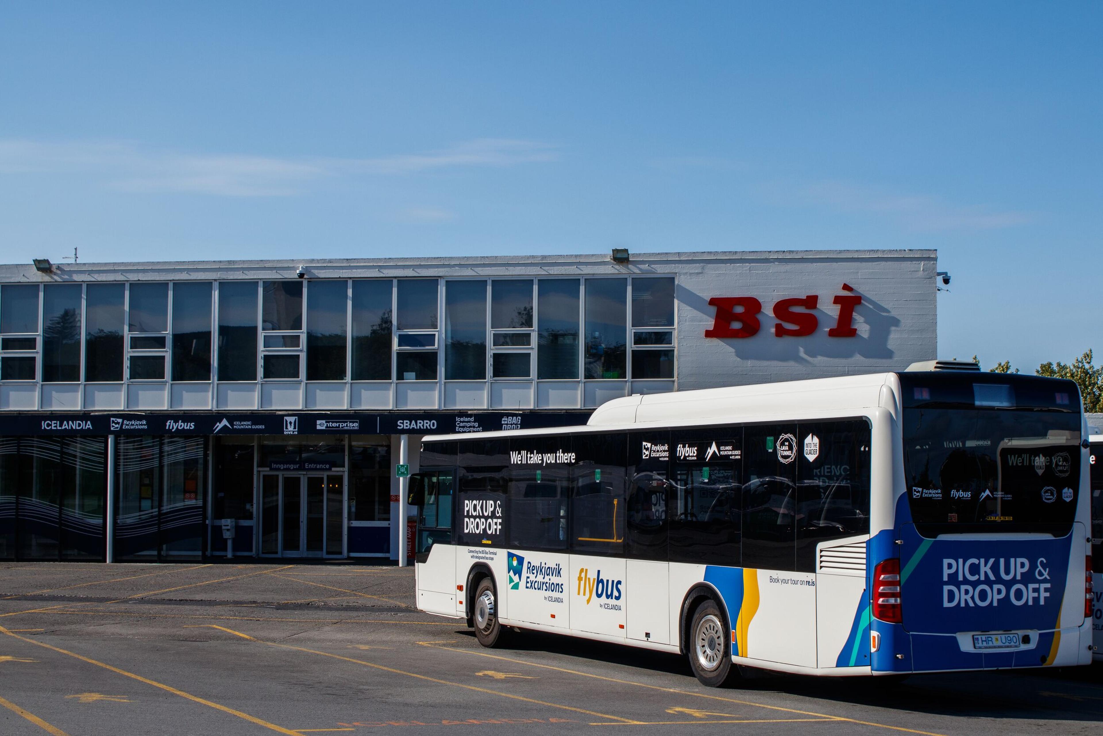 A bus parked outside the landmark building BSÍ in downtown Reykjavik