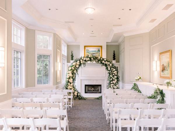 Ceremony in The Preserve Room, floral arch