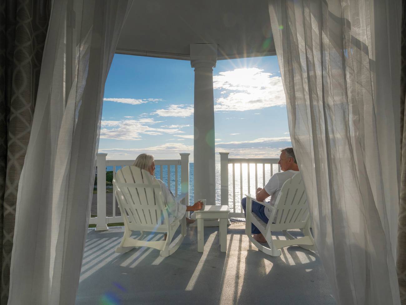 Couple on Inn at Bay Harbor balcony