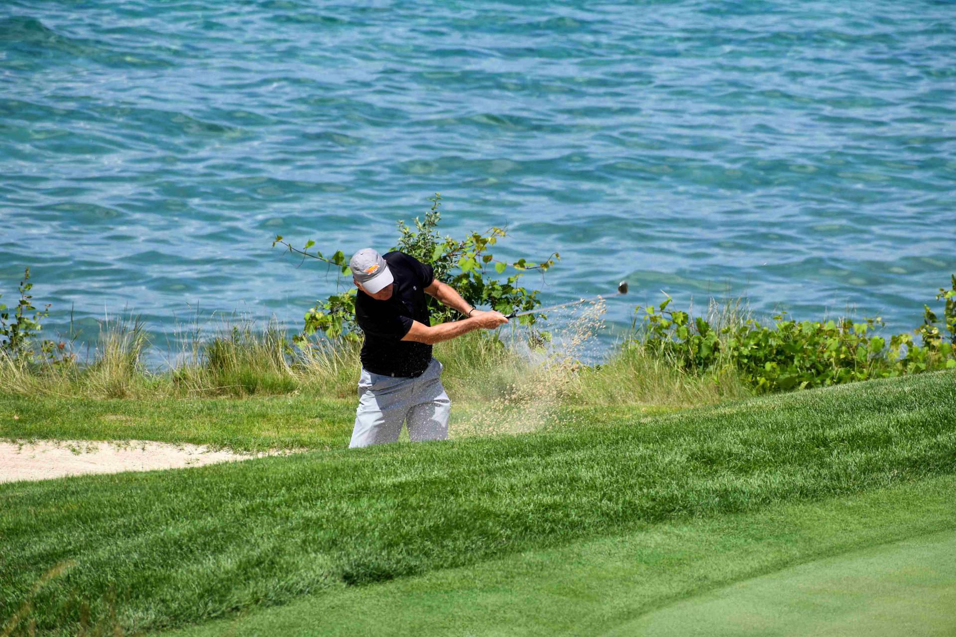 golfers on Quarry 8 green