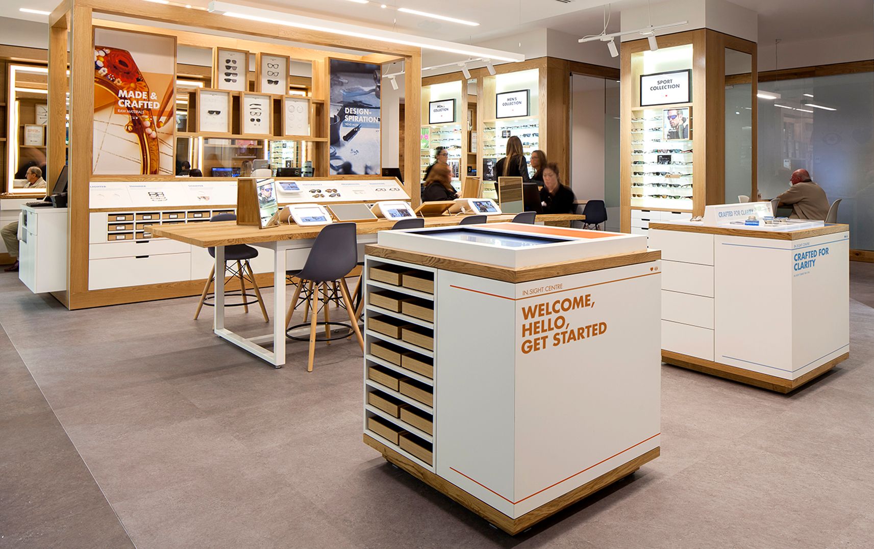 Group of workers inside of a modern retail eyewear store