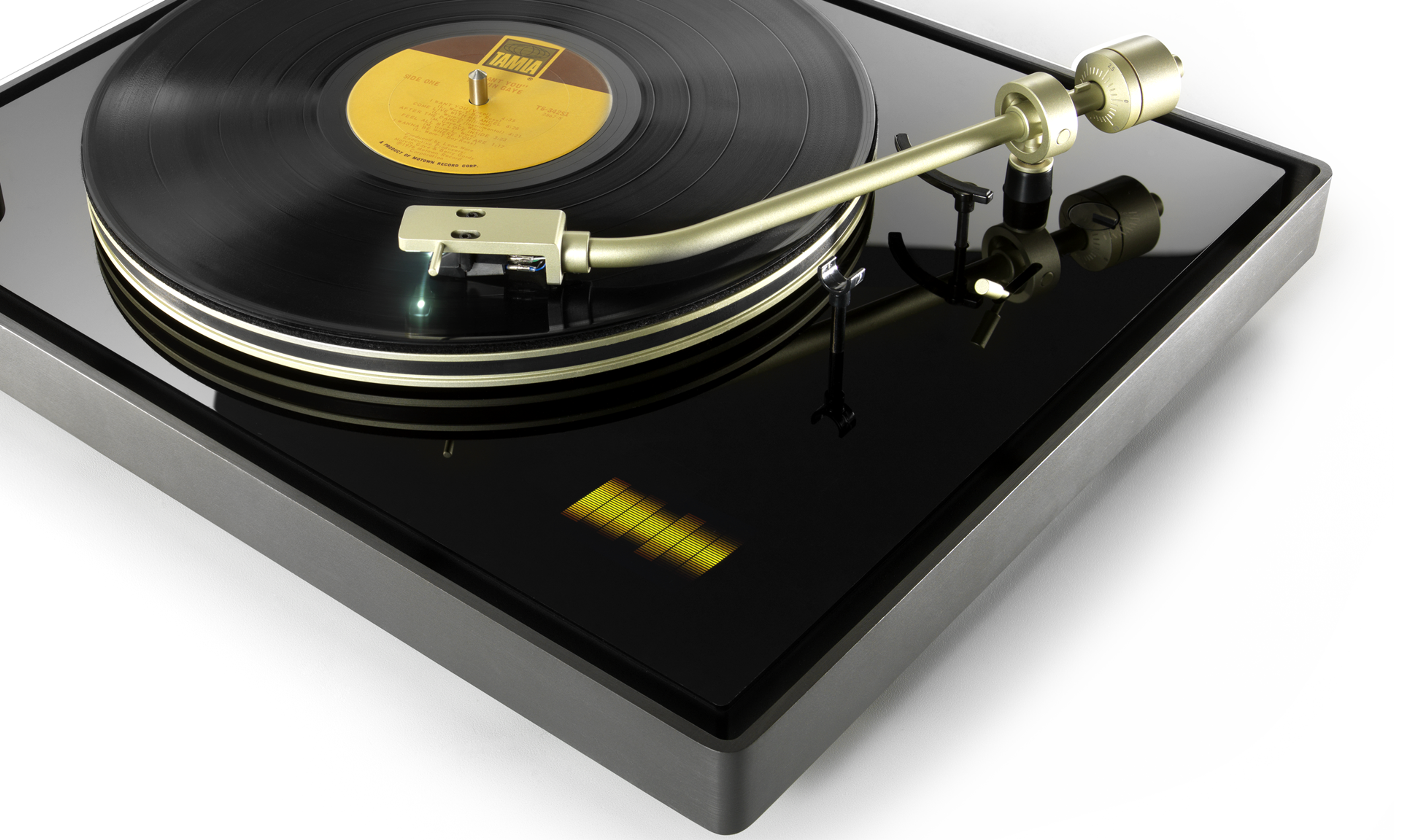 Black record player spinning a record, with a gold needle arm and a digital interface showing orange audio waves