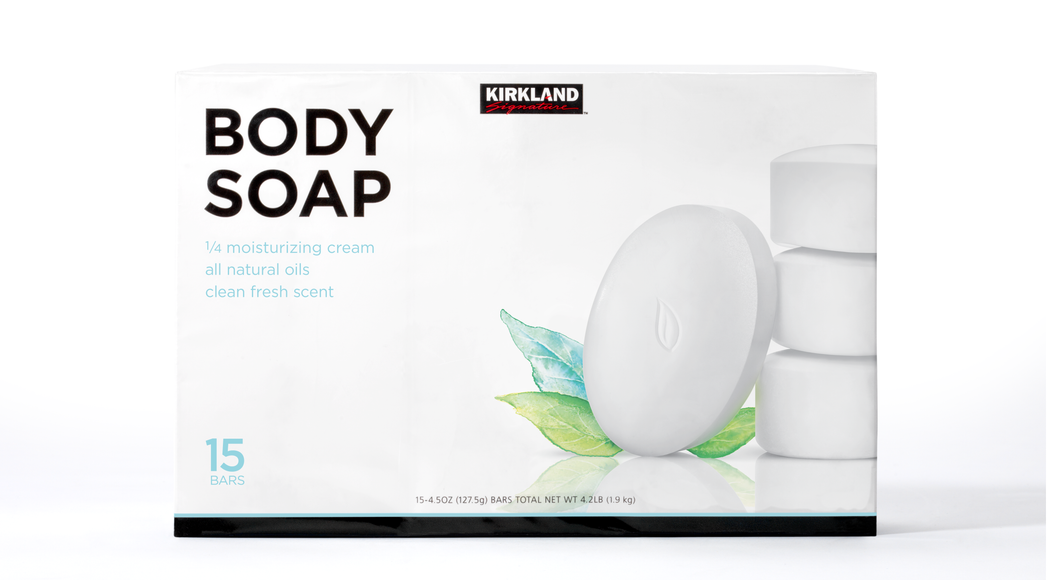 Package of Kirkland Signature Body Soap, featuring an image of a stack of white soap bars with one bar leaning against the stack, and decorative painted blue and green leaves