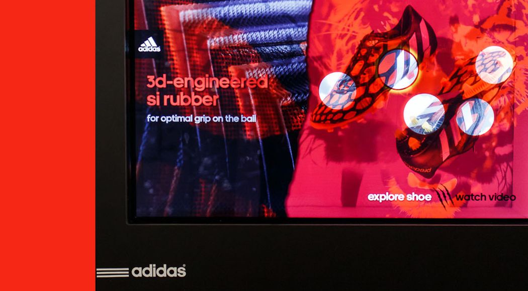 Touch screen that reads “3d-engineered si rubber” in a black box holding two suspended cleats