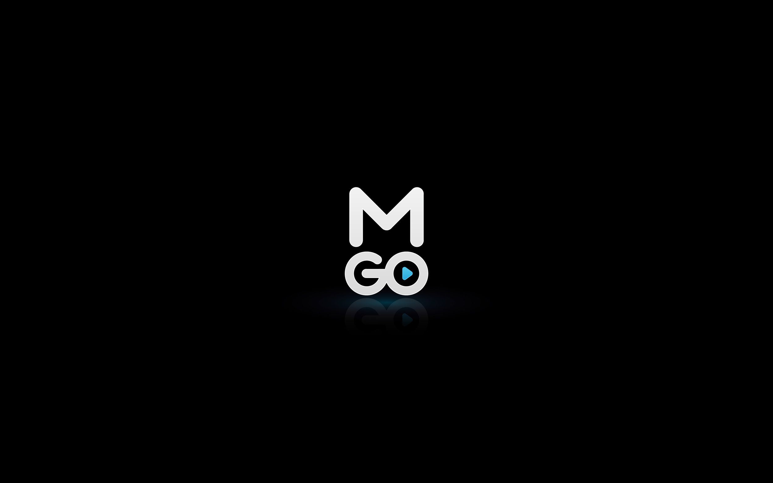 The letter M placed above the word GO, with a play button in the middle of the letter O