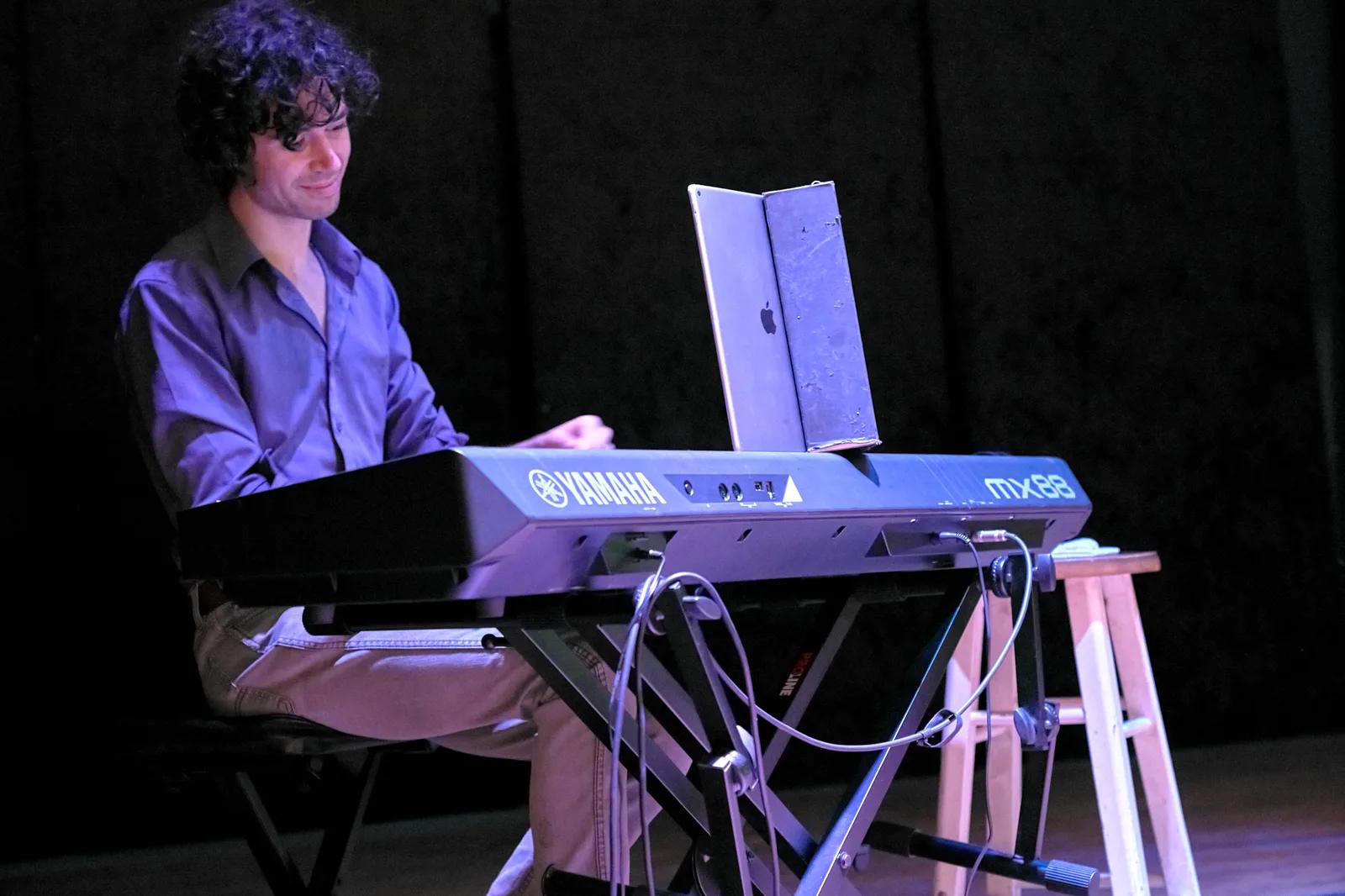 A musician playing keyboard during the Gala.