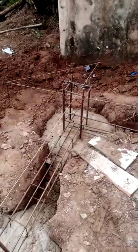Reinforcement and concrete being prepared for tank foundations.