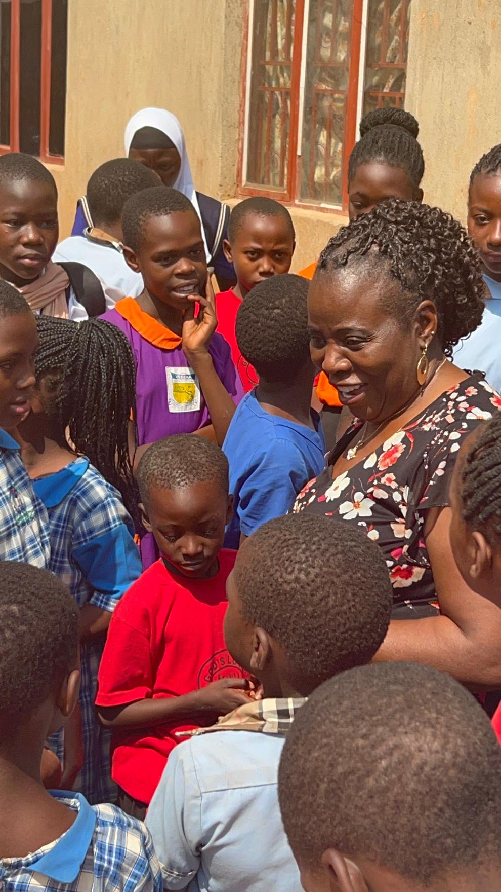 Benedicta Ogbonnaya with schoolchildren.